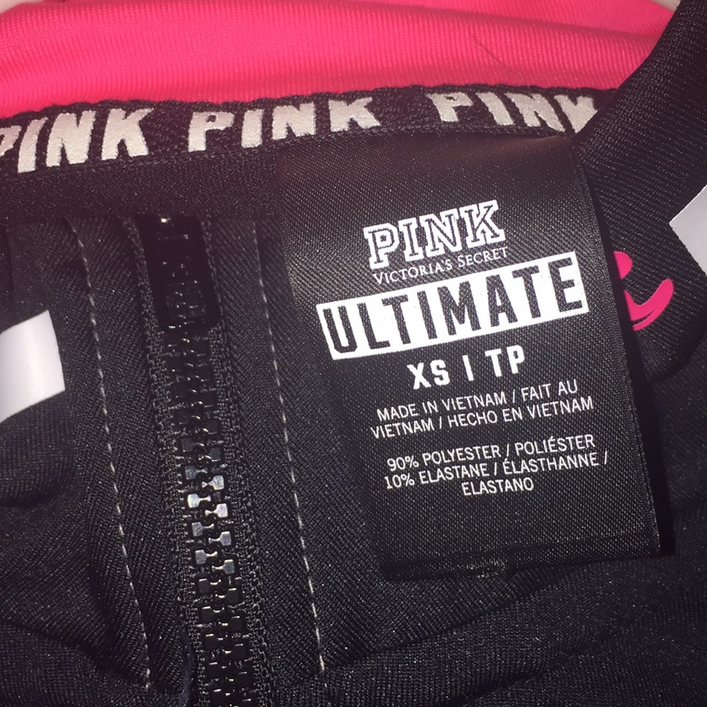 a pink brand jacket. - Picture 3 of 3